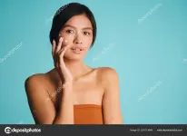 depositphotos_321013648-stock-photo-attractive-asian-brunette-girl-with.webp