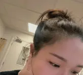 messy-bun-on-shift-v0-1adez445o6bg1.webp