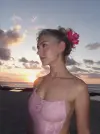 Photo by Eva Elfie on June 04, 2026. May be an image of sundress, beach, ocean and text.webp